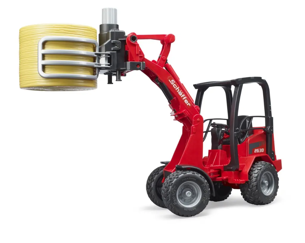 Schäffer Compact loader 2630 with bale gripper + bale 3.webp